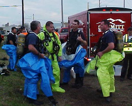 Group of fire fighters taking a break from the hard training day.